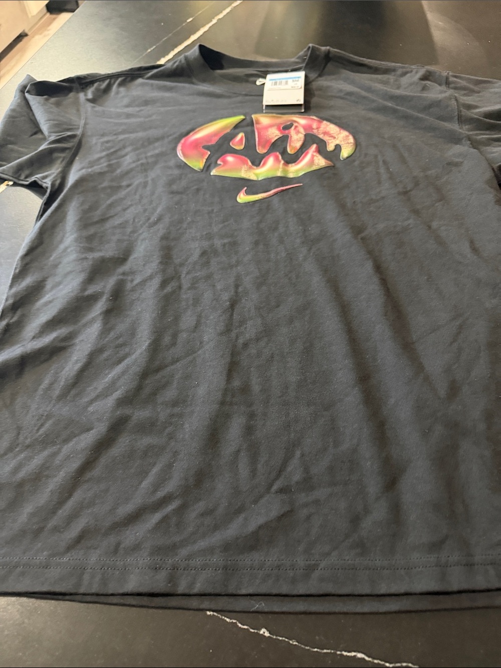 Nike Black Short-Sleeve Tee with Neon Swirl Logo